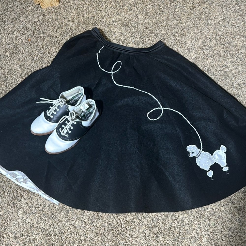 50’s poodle skirt, slip, and Oxford shoes